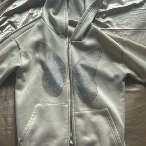 Butterfly rhinestone zip up hoodie.